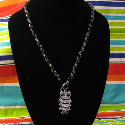 Hand woven glass beaded spiral rope with owl - 25 inches