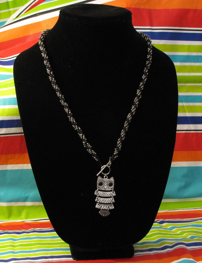 Hand woven glass beaded spiral rope with owl - 25 inches