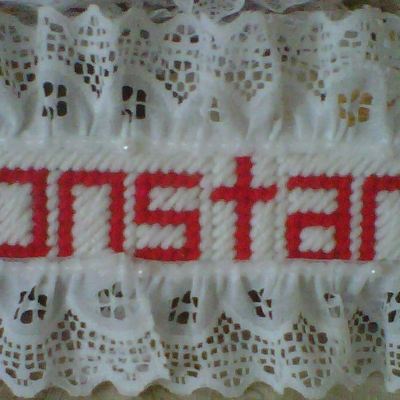 Needlepoint bookmark with lace and pearls