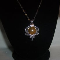 Round Tiger's Eye Pendant In Silver Plated Setting