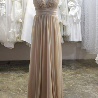 Deep v-neckline champagne bridesmaid dress