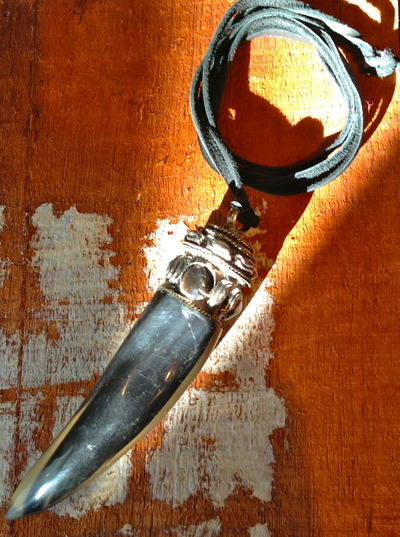 Horn pendant necklace on black deerskin leather lace