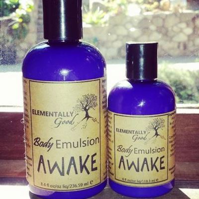 Awake aromatherapeutic body moisturizer