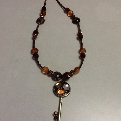 Necklace with key pendant