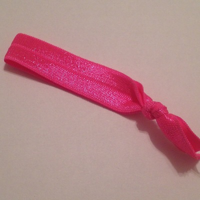 Neon pink hair tie