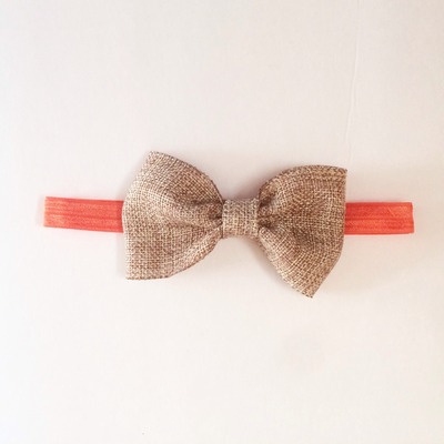 Burlap bow on orange elastic
