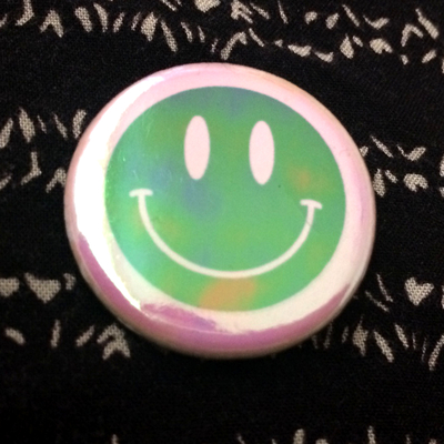 90's happy face pinback button