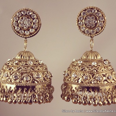 Gold jhumke earrings