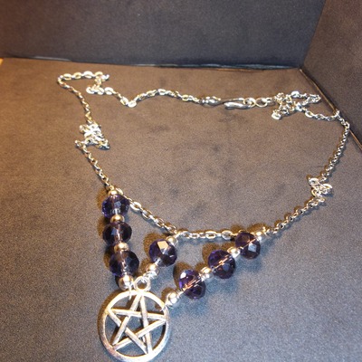 Rondelle with pentacle circlet
