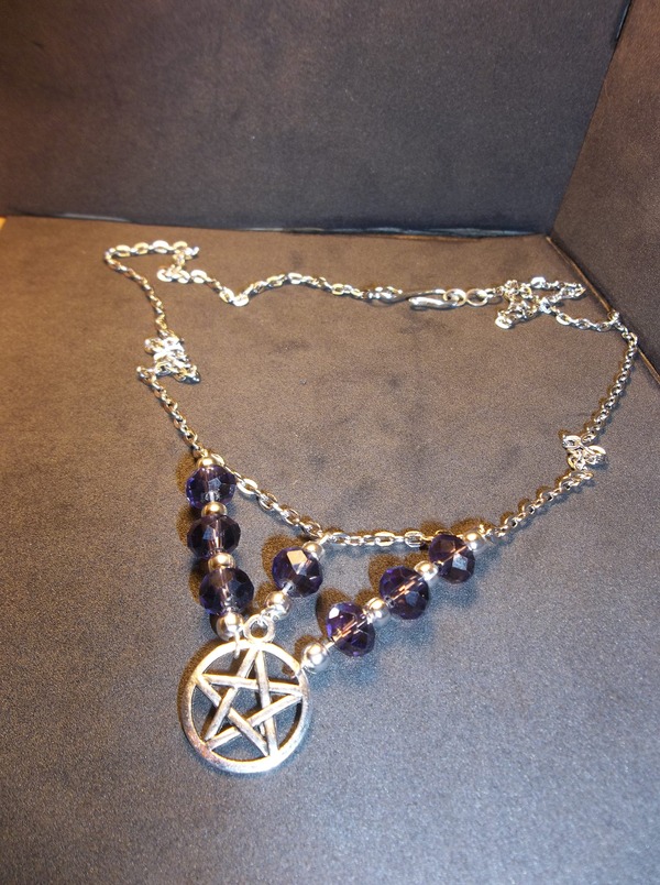 Rondelle with pentacle circlet