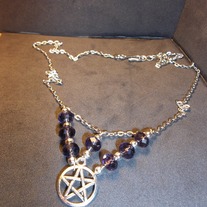 Rondelle with pentacle circlet