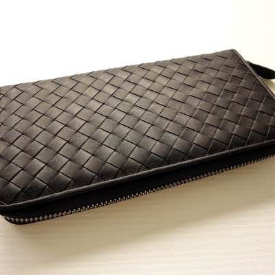 Black nero leather woven zip around wallet - unisex