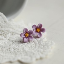 lucy. little wild flower stud earrings in romantic purple colour