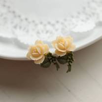 pretty single rose earrings. in ivory.