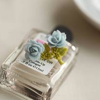 pretty single rose earrings. in light blue. - Thumbnail 1