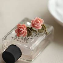 pretty single rose earrings. in light pink. - Thumbnail 1