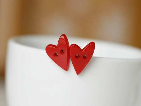 you break my heart. heart shape button earrings.