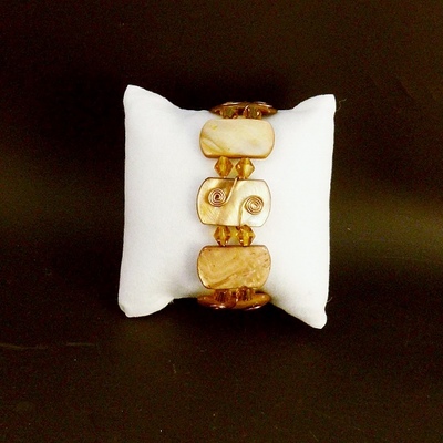 Orange mother of pearl, crystal, and copper bracelet