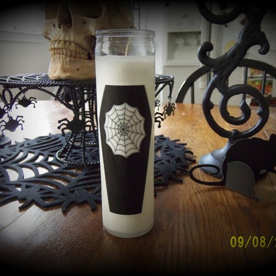 Creepy spider web coffin candle