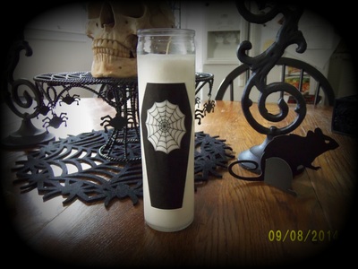 Creepy spider web coffin candle