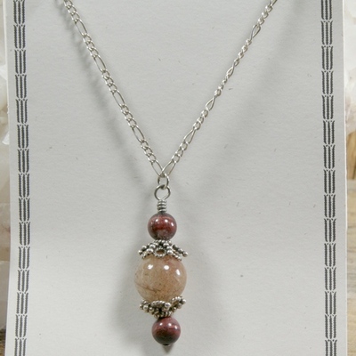 Red rutilated quartz and tiger iron pendant on silver chain