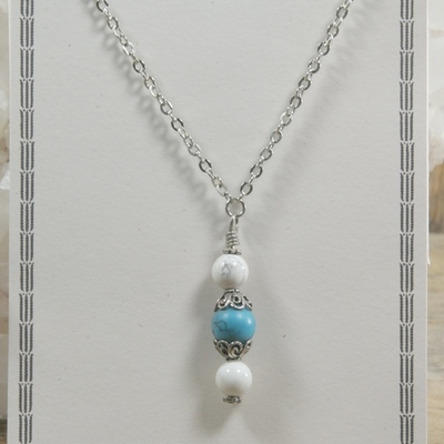 Dyed howlite and howlite pendant on silver chain