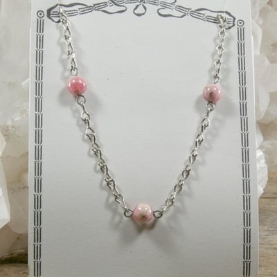 Rhodochrosite on silver chain necklace