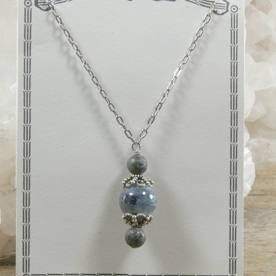 Blue kyanite and pyrite pendant on silver chain necklace