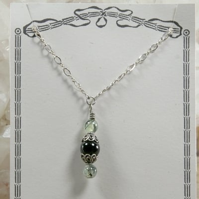 Onyx and green tourmalated quartz pendant on silver chain necklace