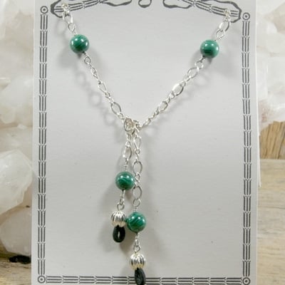 Malachite eye glass holders