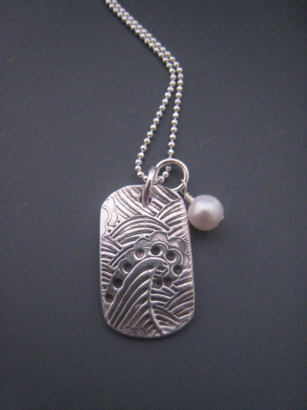 Mavericks Tag M, on chain with pearl