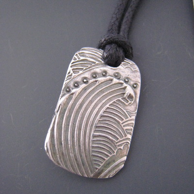 Mavericks tag m, on cord 