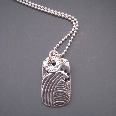 Mavericks tag s, on chain with washer