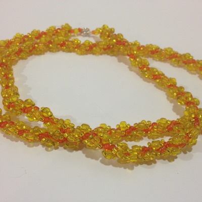 Hand woven glass beaded spiral rope - orange and yellow
