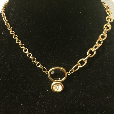 Dual circle stone center anchors chains