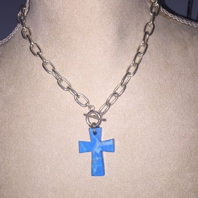 Criss on silver chain with a front clasp