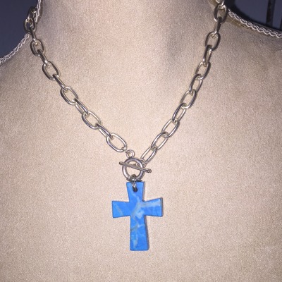 Criss on silver chain with a front clasp