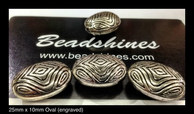 Engraved Oval beads (dz) 25mm x 10mm