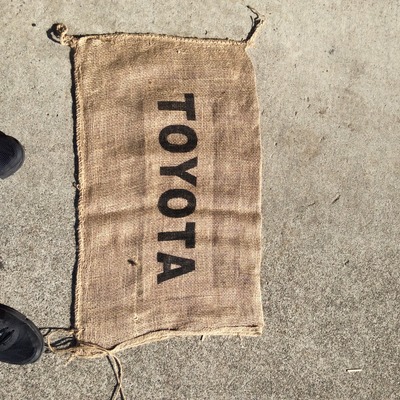 Burlap sack black writing