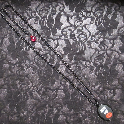 “bite me” vampire cameo necklace