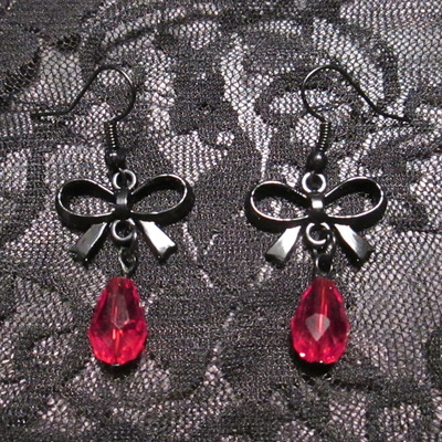 Black bows and blood drop earrings  