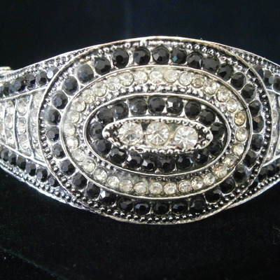 Perfect little black dress bracelet clear and black rhinestones and a silver oval pattern hinged bracelet free shipping