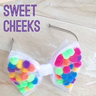 Sweet cheeks pom pom bow