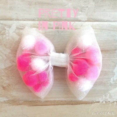 Pretty in pink pom pom bow