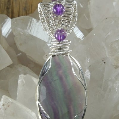 Rainbow fluorite with amethyst pendant