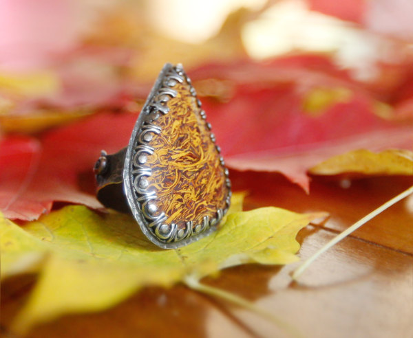 Script stone and sterling silver ring handmade by Thornbird Studios