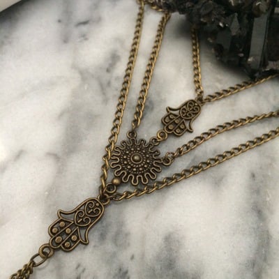 Namaste hamsa handchain in brass