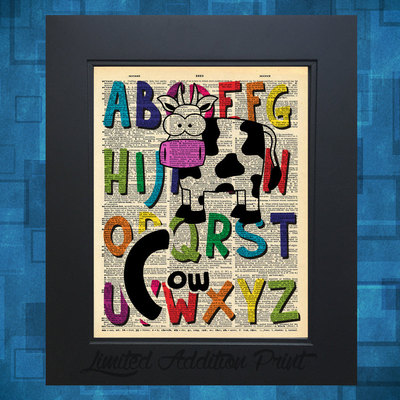 C is for cow alphabet art print on vintage upcycled dictionary page