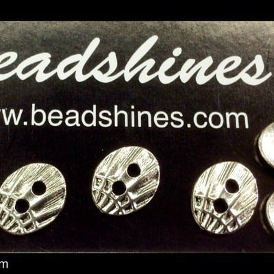 Oval button 16mm x 12mm