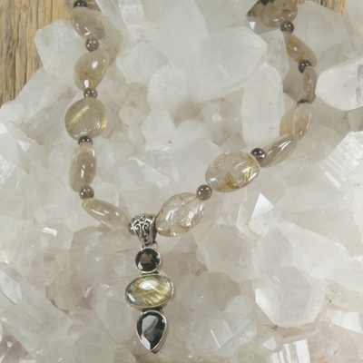Golden rutilated quartz and smokey quartz with matching pendant